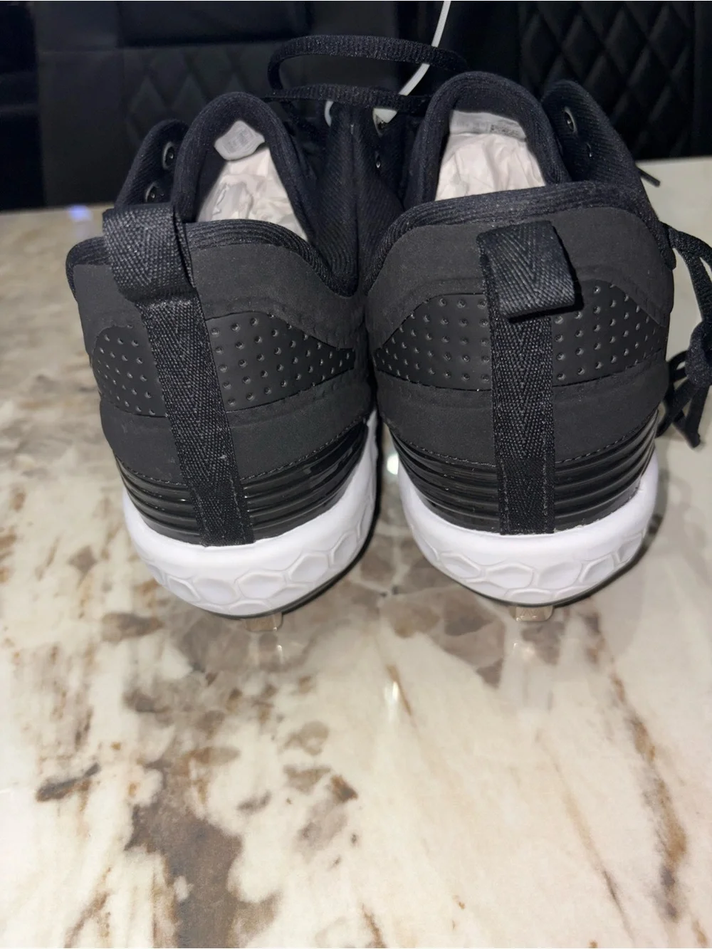 New Balance Men’s Black and White Baseball Cleats with Metal Spikes